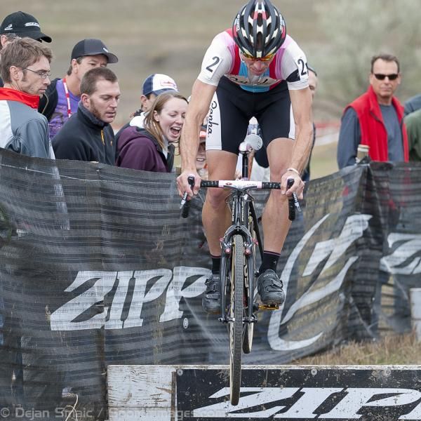 Powers demonstrating how to ride his bike, I mean fly his bike over the barriers - Part Duex