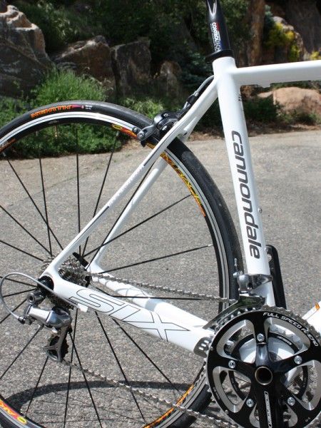 The Six Carbon 3 frame uses a more conventional lug-and-overwrap construction method to attach the stays so they're not quite as stiff, smooth-riding, or light as the higher-end SuperSix.