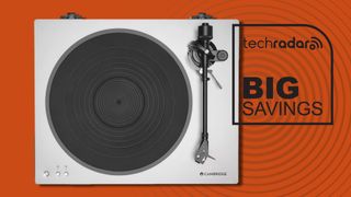Cambridge Audio Alva ST turntable on orange background with TR's Big Savings badge