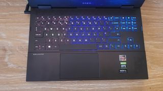 A top down shot of the HP Omen 15 keyboard and touchpad