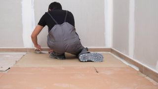 Placing cardboard on hardwood floor