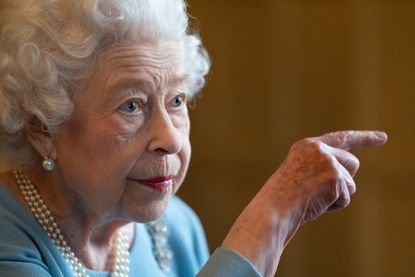 Britain's Queen Elizabeth II gestures during a reception in the Ballroom of Sandringham House, the Queen's Norfolk residence on February 5, 2022, as she celebrates the start of the Platinum Jubilee. - Queen Elizabeth II on Sunday will became the first British monarch to reign for seven decades, in a bittersweet landmark as she also marked the 70th anniversary of her father's death. (Photo by Joe Giddens / POOL / AFP) (Photo by JOE GIDDENS/POOL/AFP via Getty Images)