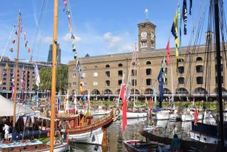 Boats with flags at St Katharine Docks