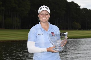 Ally Ewing holds the 2020 LPGA Drive On Championship trophy