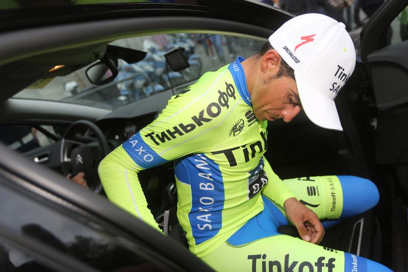 Alberto Contador gets into the team car after the stage