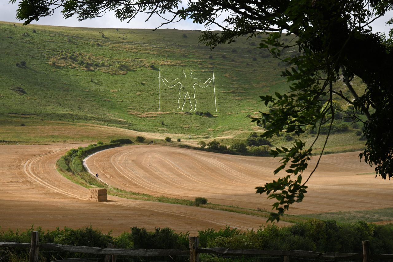The Long Man of Wilmington, an ancient chalk giant on the South Downs of East Sussex.