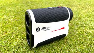 GolfBuddy Laser Lite 2 Rangefinder resting on the green