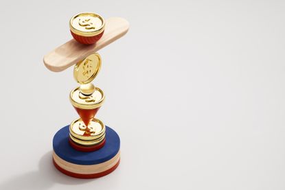 digital image of gold coins with dollar signs being balanced on top of a blue, tan and red wooden circle