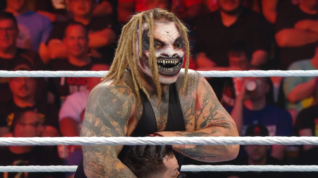 Bray Wyatt attacking Finn Balor