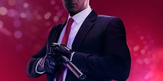 Agent 47 readies his pistol.