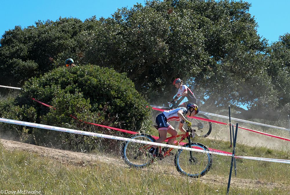 Kate Courtney (Specialized) leading down some switchbacks during the first lap