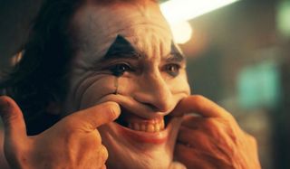 Joker forcing a smile