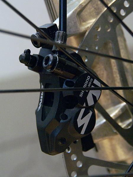 New four-piston calipers