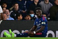 Arsenal's English midfielder #07 Bukayo Saka reacts having been fouled during the English Premier League football match between Fulham and Arsenal at Craven Cottage in London on October 18, 2025.