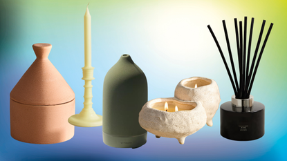 arrangement of scented candles and difusers
