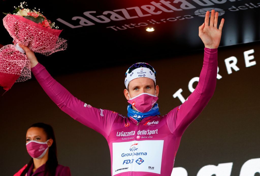 Team GroupamaFDJ rider Frances Arnaud Demare wearing a face mask celebrates on the podium after receiving the ciclamino jersey for points classification in the 8th stage of the Giro dItalia 2020 cycling race a 200kilometer route between Giovinazzo and Vieste on October 10 2020 Photo by Luca Bettini AFP Photo by LUCA BETTINIAFP via Getty Images