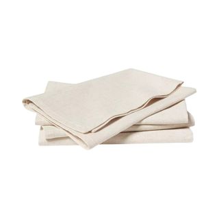 A set of four neutral colored napkins