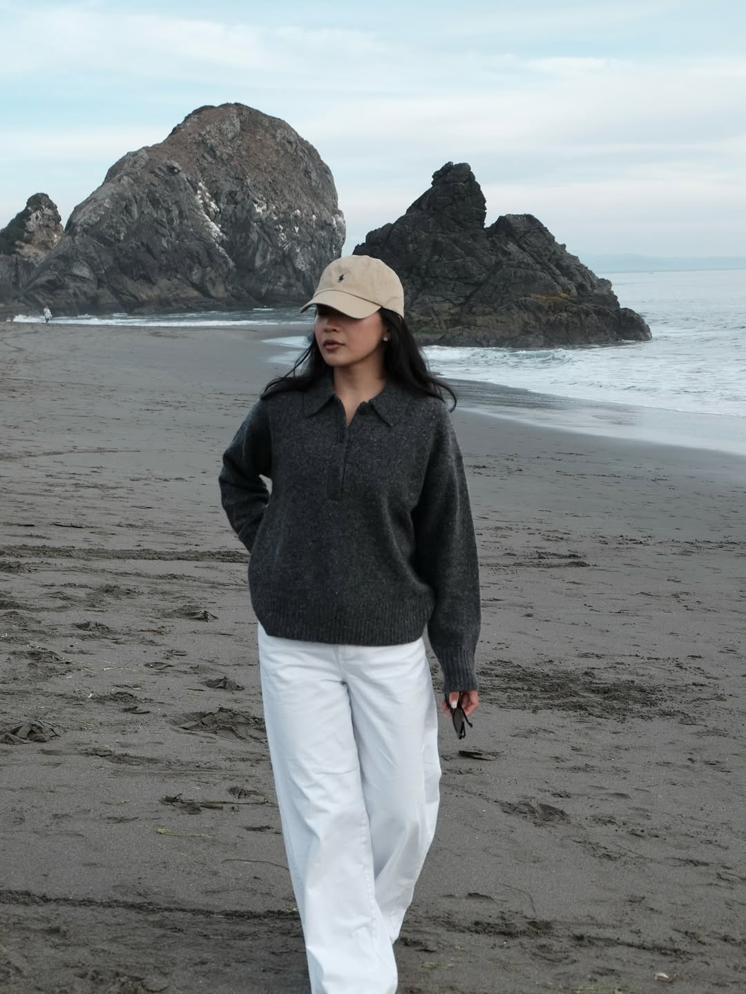 Dawn in polo knit, cap and white jeans