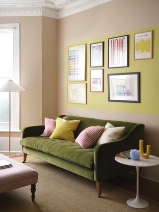 beige and yellow living room with green sofa