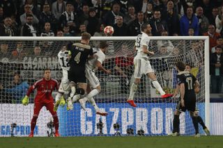 Ajax’s teenager Matthijs de Ligt, fourth right, heads home the winner in Tuesday's second leg of their quarter-final against Juventus in Turin