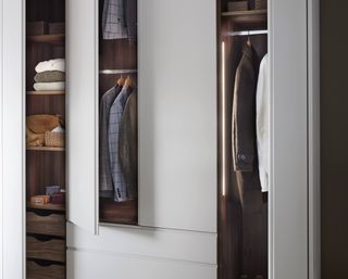 closet with open doors, LED lights, hanging and shelving space