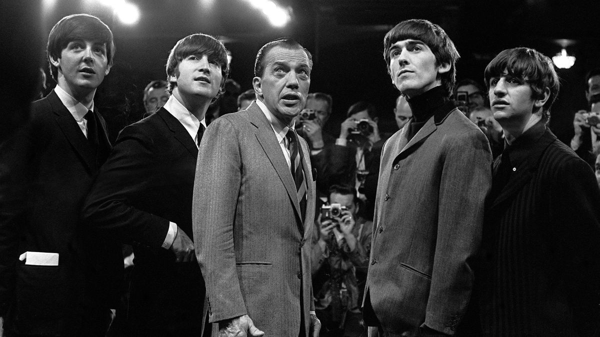 The Beatles with television host Ed Sullivan. 9th February 1964.