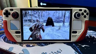 God of War Ragnarök with Kratos running on a Steam Deck OLED