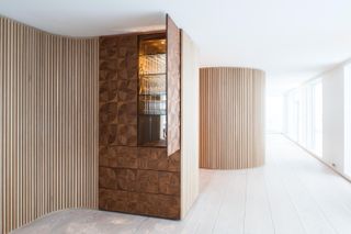 Oslo penthouse by Stian Schjelderup and Øystein Trondahl with its highly articulated interior wood cladding