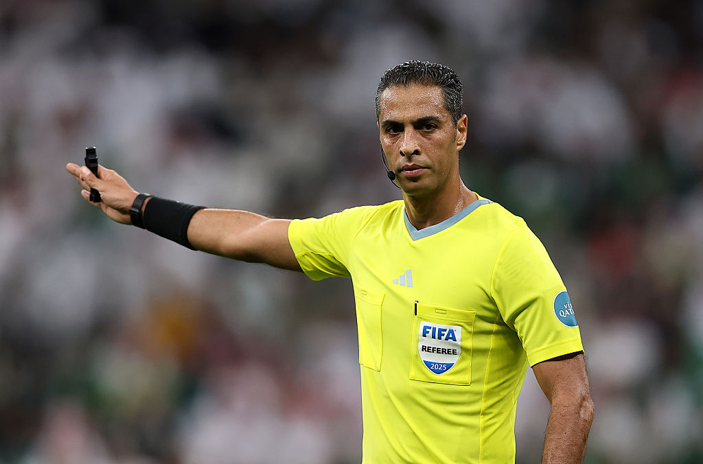 LUSAIL CITY, QATAR - DECEMBER 11: Referee Amin Mohamed Omar gestures during the FIFA Arab Cup 2025 Quarter Final match between Palestine and Saudi Arabia at Lusail Stadium in Lusail City, Qatar