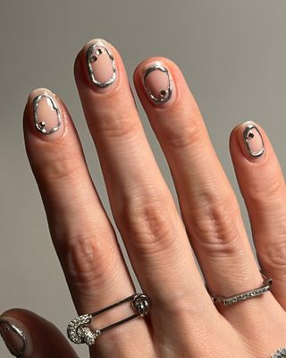 Bold negative space nails.