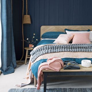 best colour combinations, Blue wall with bed and cushion, scandi style