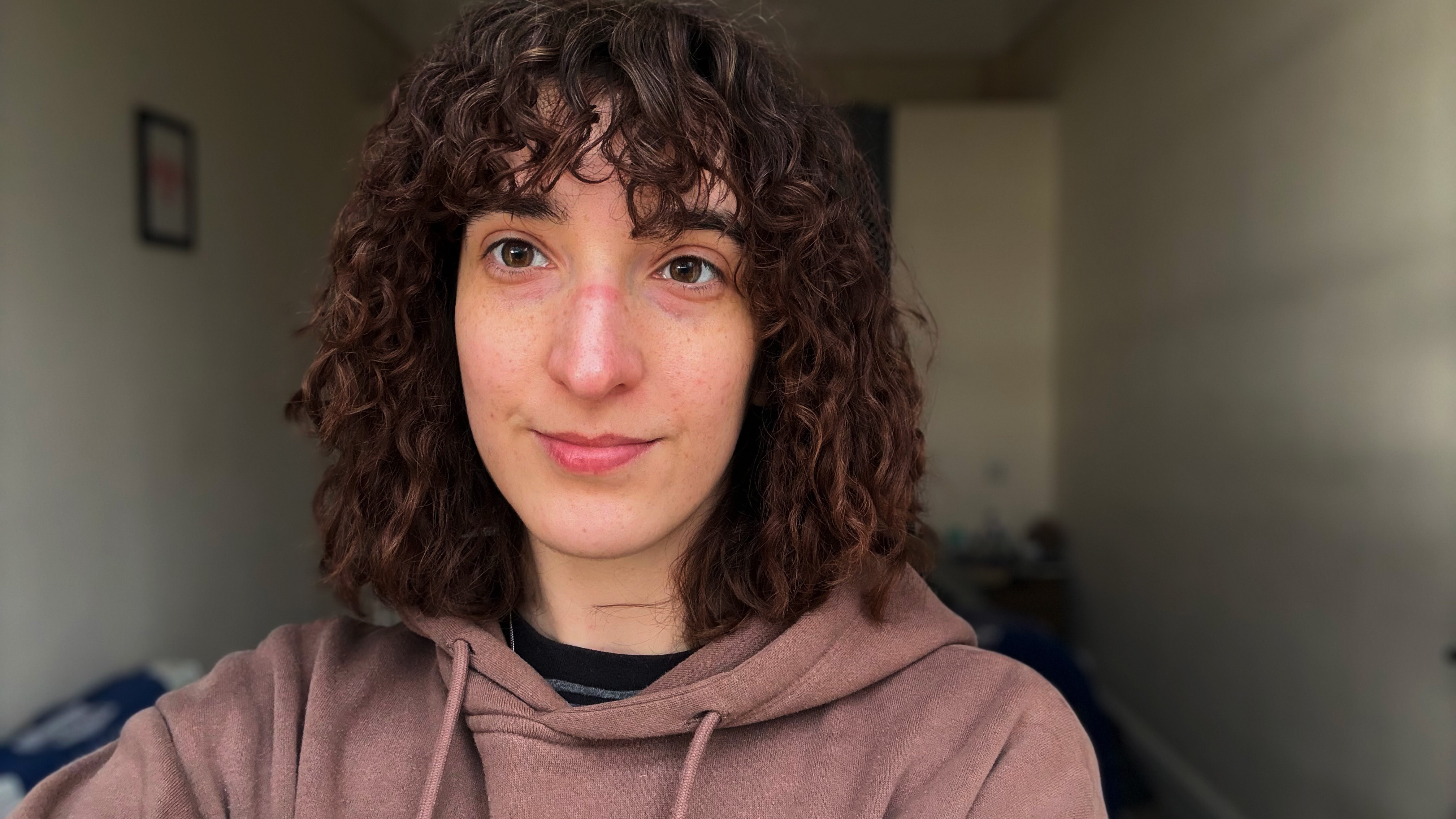 a photo of the author after using the ulike reglow led skincare mask