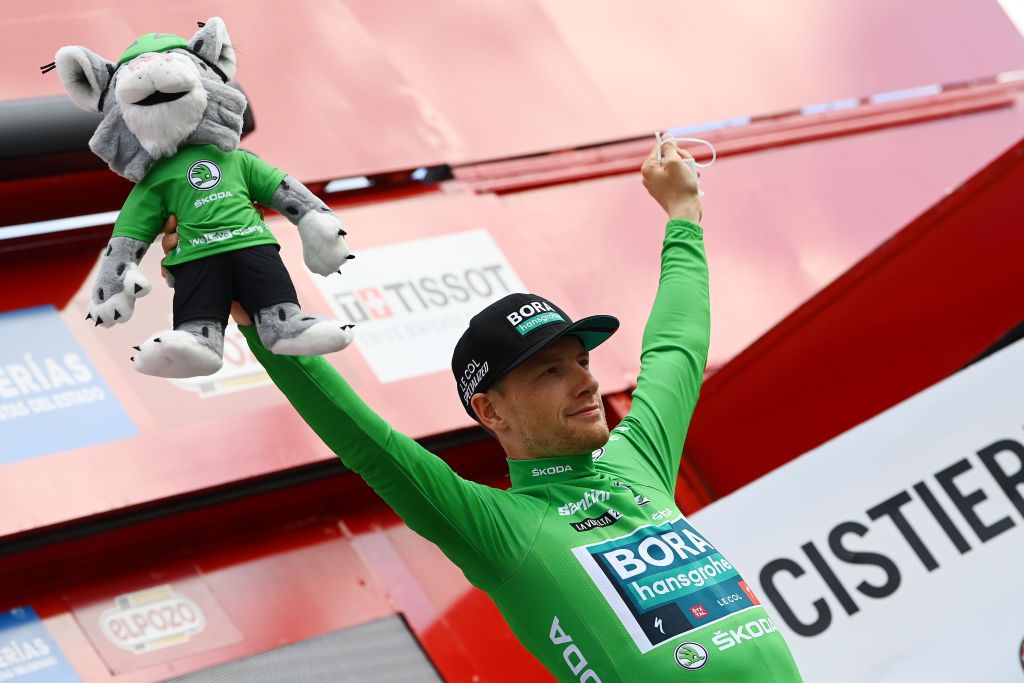CISTIERNA SPAIN AUGUST 26 Sam Bennett of Ireland and Team Bora Hansgrohe Green Points Jersey celebrates at podium during the 77th Tour of Spain 2022 Stage 7 a 190km stage from Camargo to Cistierna LaVuelta22 WorldTour on August 26 2022 in Cistierna Spain Photo by Tim de WaeleGetty Images