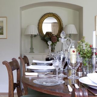 dining room with white walls and table with chairs