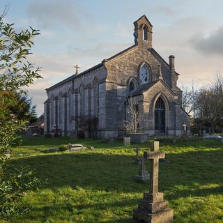 church exterior with graveyard