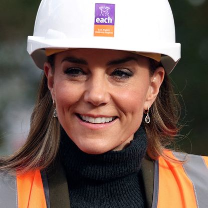 Princess Kate wearing a hard hat and high vis vest