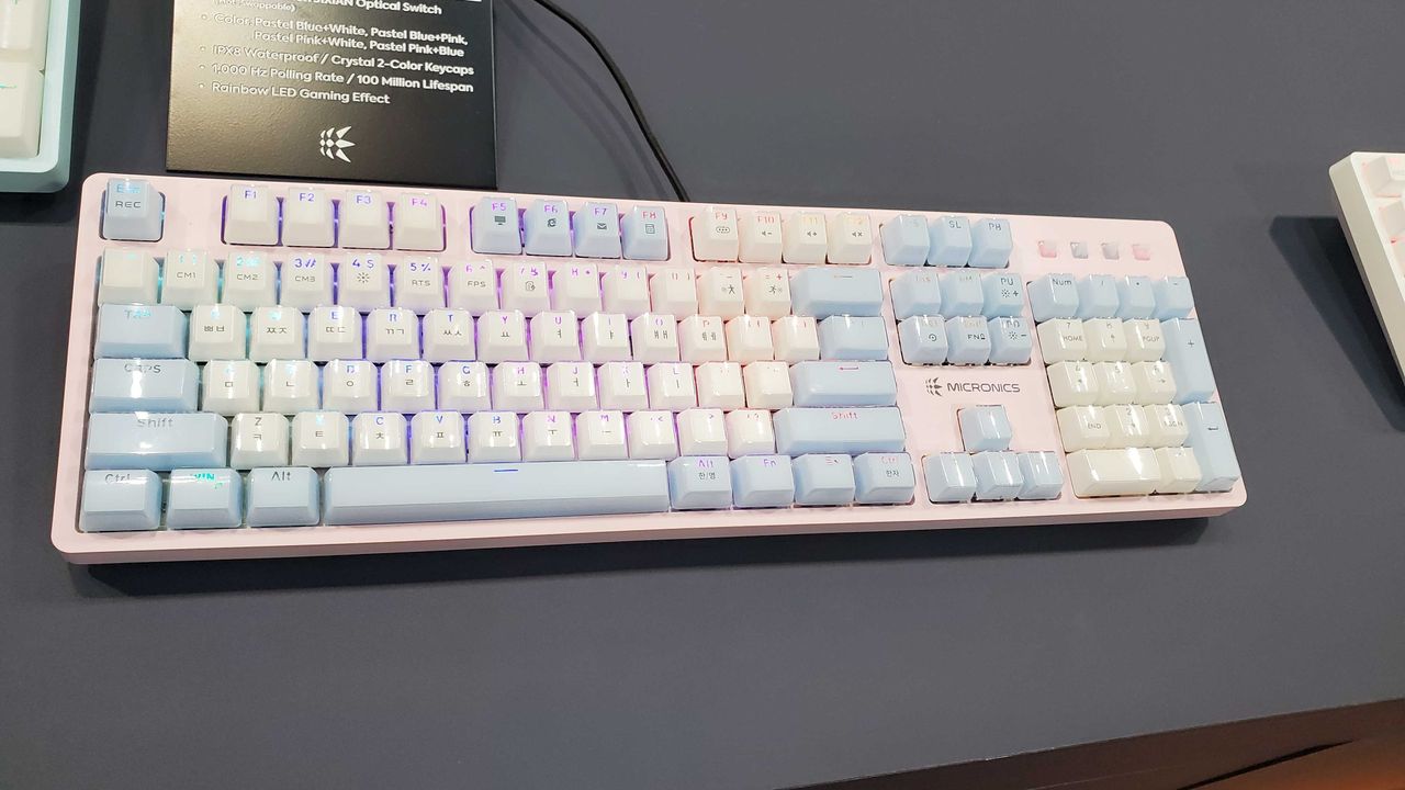 pink and blue keyboard with backlight