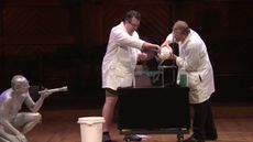 During a science break for the 2014 Ig Nobel Awards ceremony on Sept. 18, presenters create a gelatin substance while a "human sparkplug" looks on. 