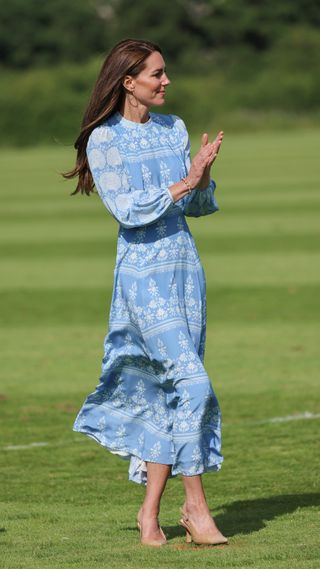 Kate Middleton in a blue and white midi dress