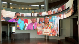 The critical centerpiece at the First Americans Museum in Oklahoma City is a curved dvLED video wall installation featuring 192 Absent Acclaim dvLED panels and Peerless-AV Seamless Bespoke mounting system.