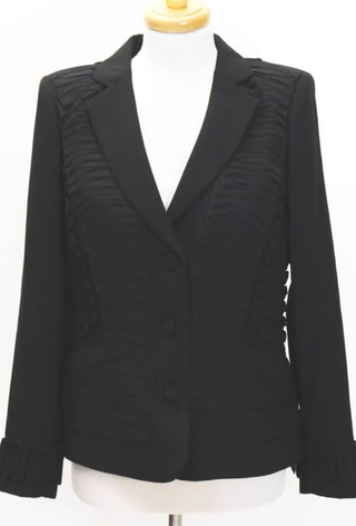 A picture of a Givenchy blazer from Oxfam.