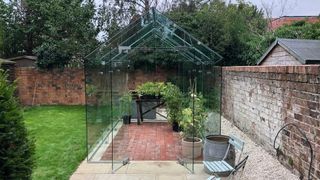 modern greenhouse with slimline frame and sleek glazing