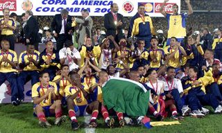 Colombia's players celebrate after their victory in the Copa America final against Mexico in July 2001.