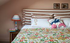 bedroom with walls painted in pink ground