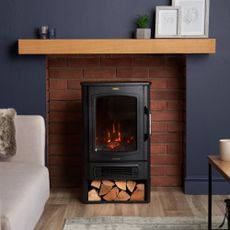 VonHaus Electric Stove & Log Store installed in a fireplace
