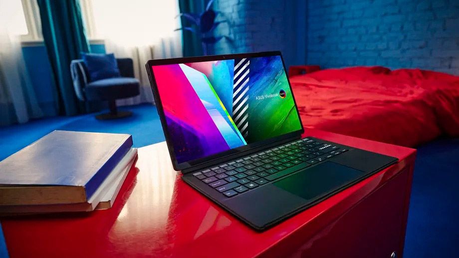 Asus Vivobook 13 Slate OLED on a desk with keyboard attached