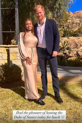 Prince Harry and Princess Senate Seeiso of Lesotho smiling in front of some trees and mountains