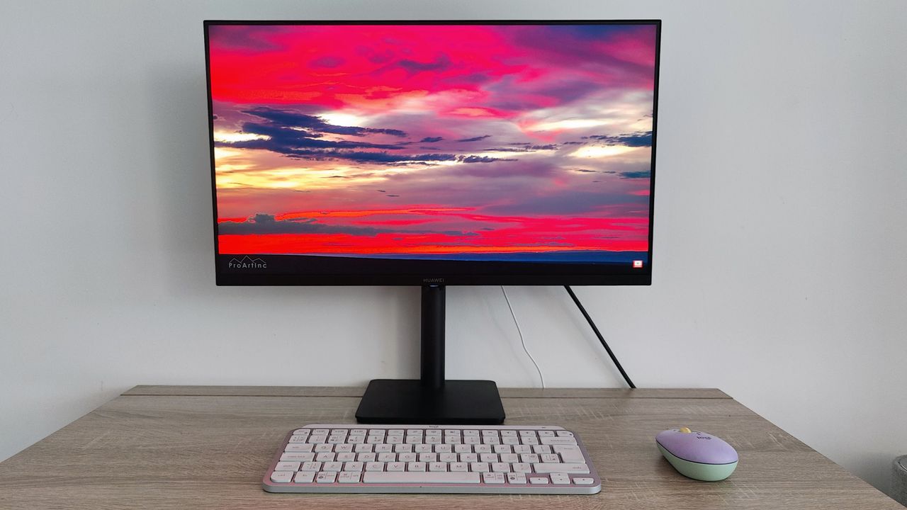 Huawei Mateview SE review: computer monitor with a picture of a sunset displayed