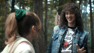 eddie and chrissy in the woods on stranger things season 4