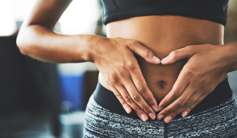 Woman distressed by gut health digestion